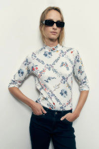 POLERA ESTAMPADA ROMBO FLORES